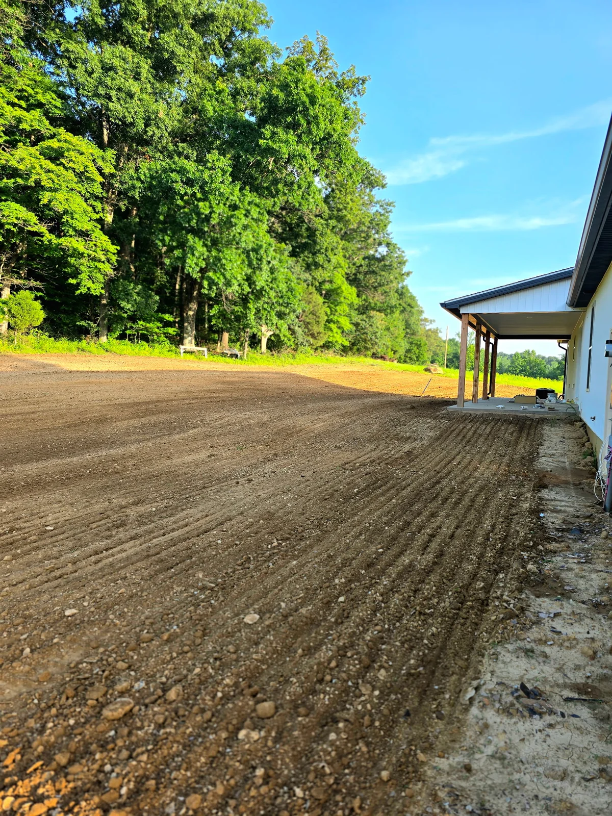 Excavation & Site Prep project by E & J General Contracting — Site Grading & Excavation in Louisville, KY (June 2026). Site grading and excavation to prep the lot for what came next. Cut, filled, and shaped drainage so water moves away from the structure instead of toward it.